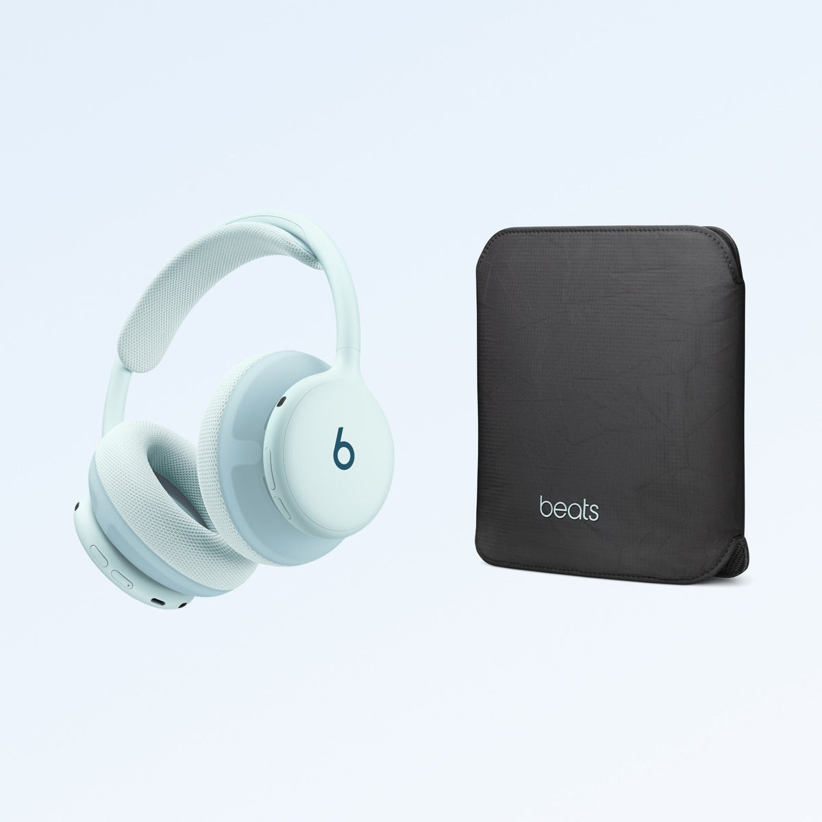 Light blue Beats 360 headphones displayed with black fabric carrying case