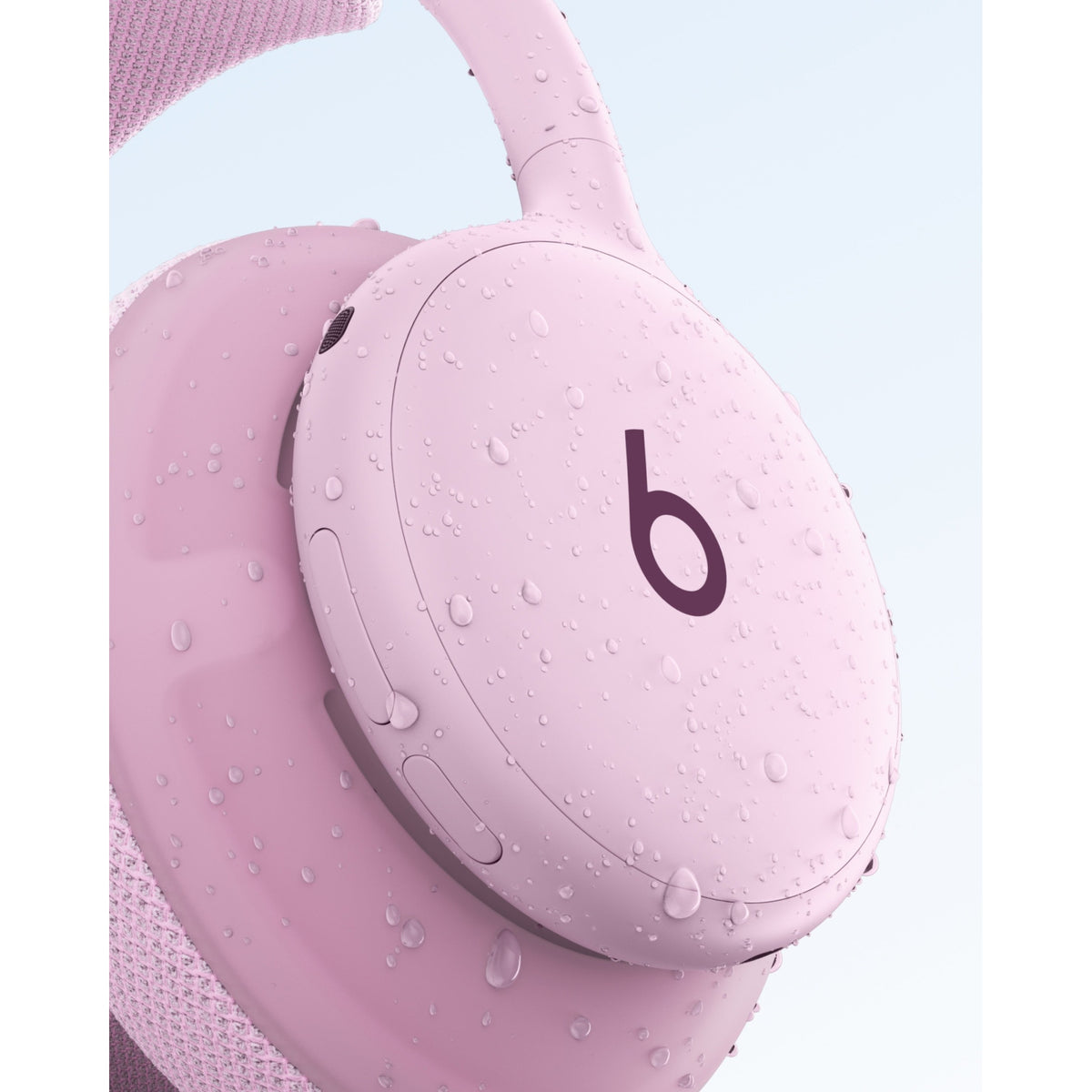 Pink Beats 360 headphones emphasizing IPX4 sweat and water resistance