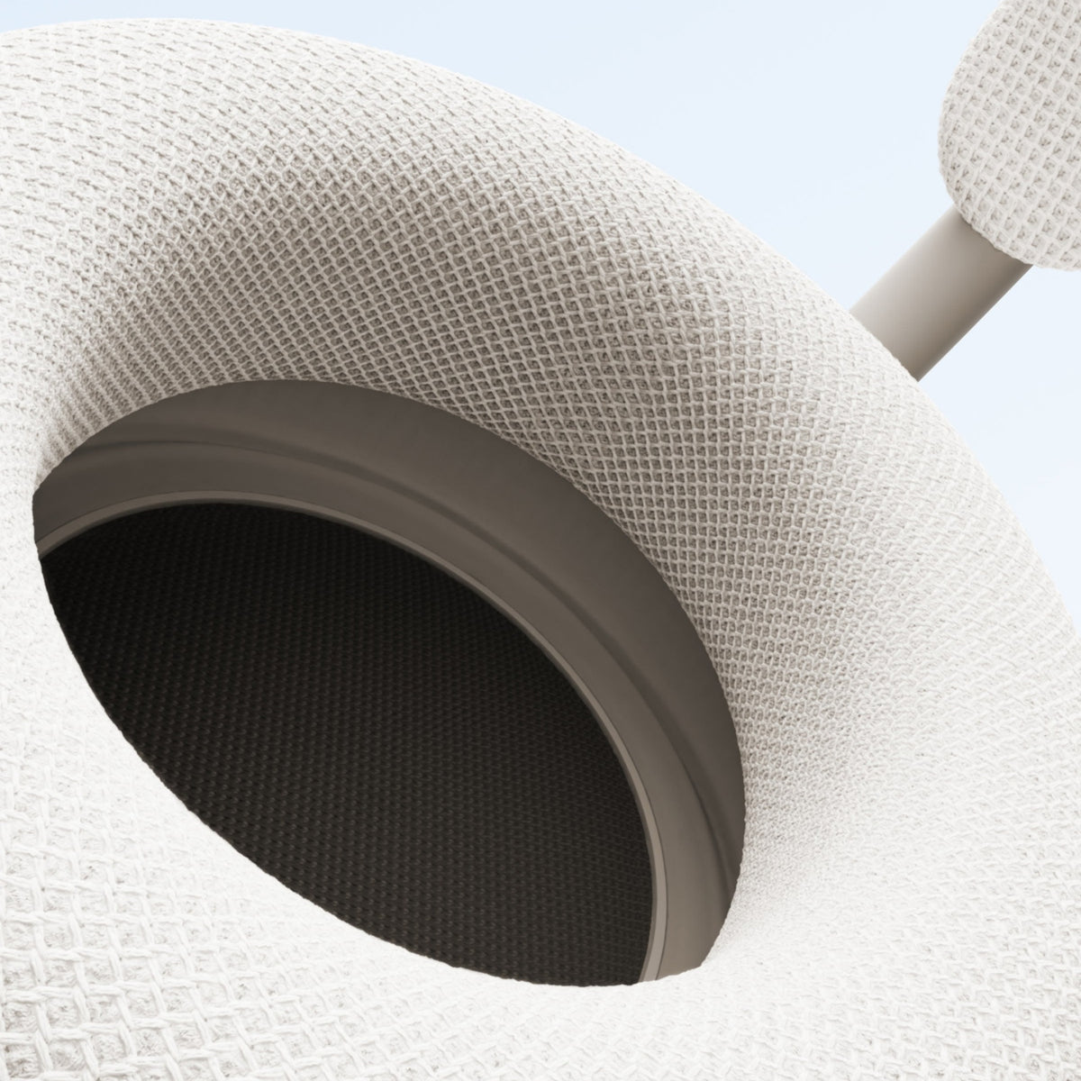 Close-up of beige Beats 360 headphone earcup showing textured diamond weave knit cushion at Nuvana Tech