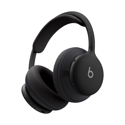 Black Beats 360 headphones three-quarter angle showing glossy shell and knit pads